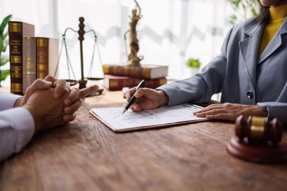 Client review meeting for a pedestrian accident settlement