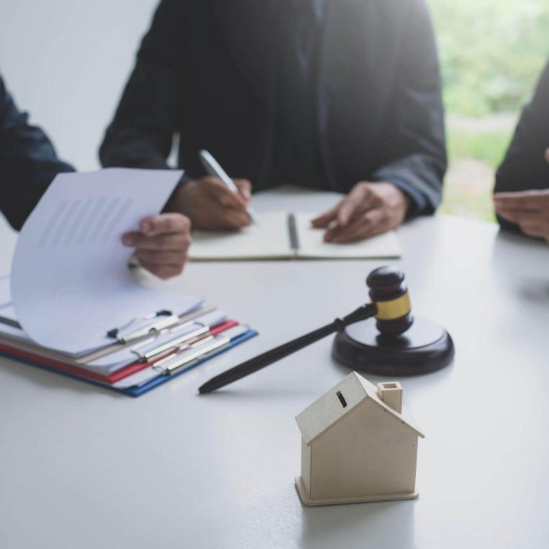 a group of people sitting around a table