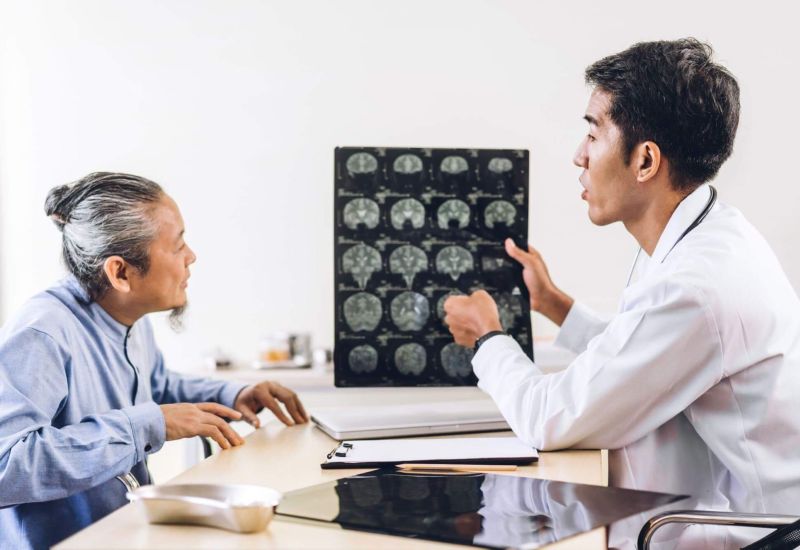 Doctor discussing traumatic brain injury with patient