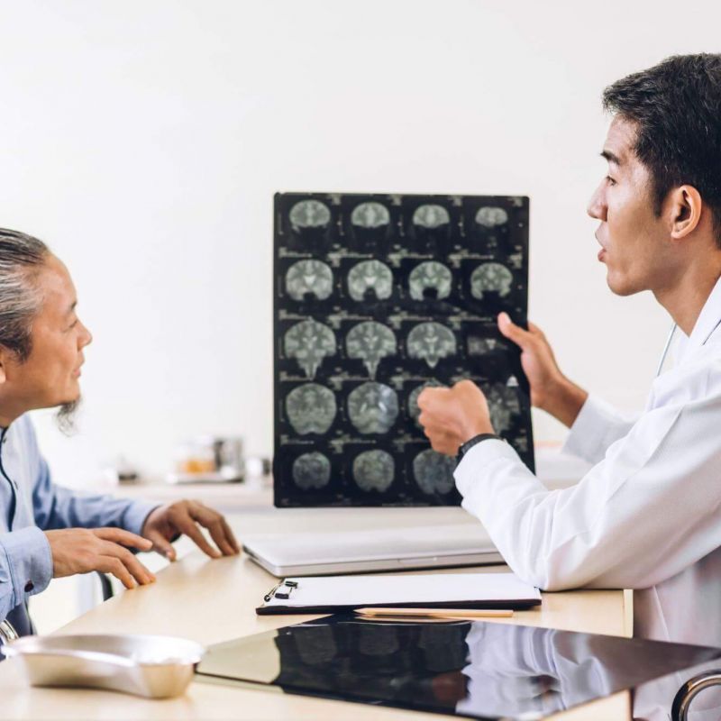 Doctor discussing traumatic brain injury with patient