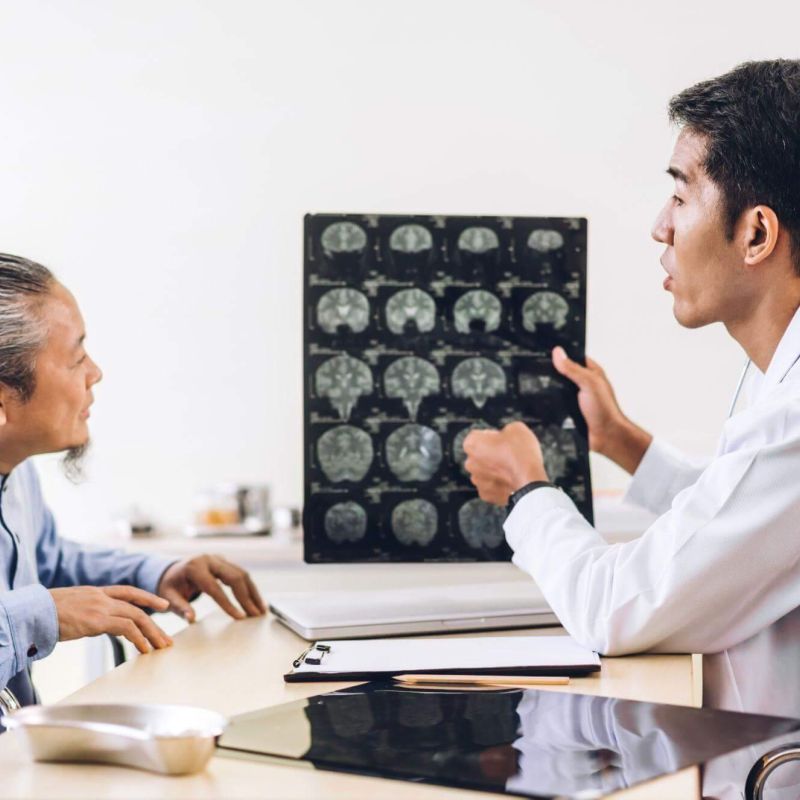 Doctor discussing traumatic brain injury with patient