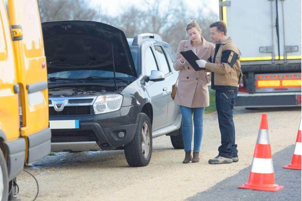 People discussing steps after a car accident.