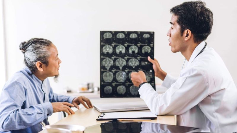 Doctor discussing traumatic brain injury with patient