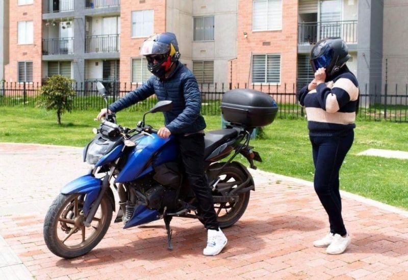 Man and woman next to a motorcycle in Virginia