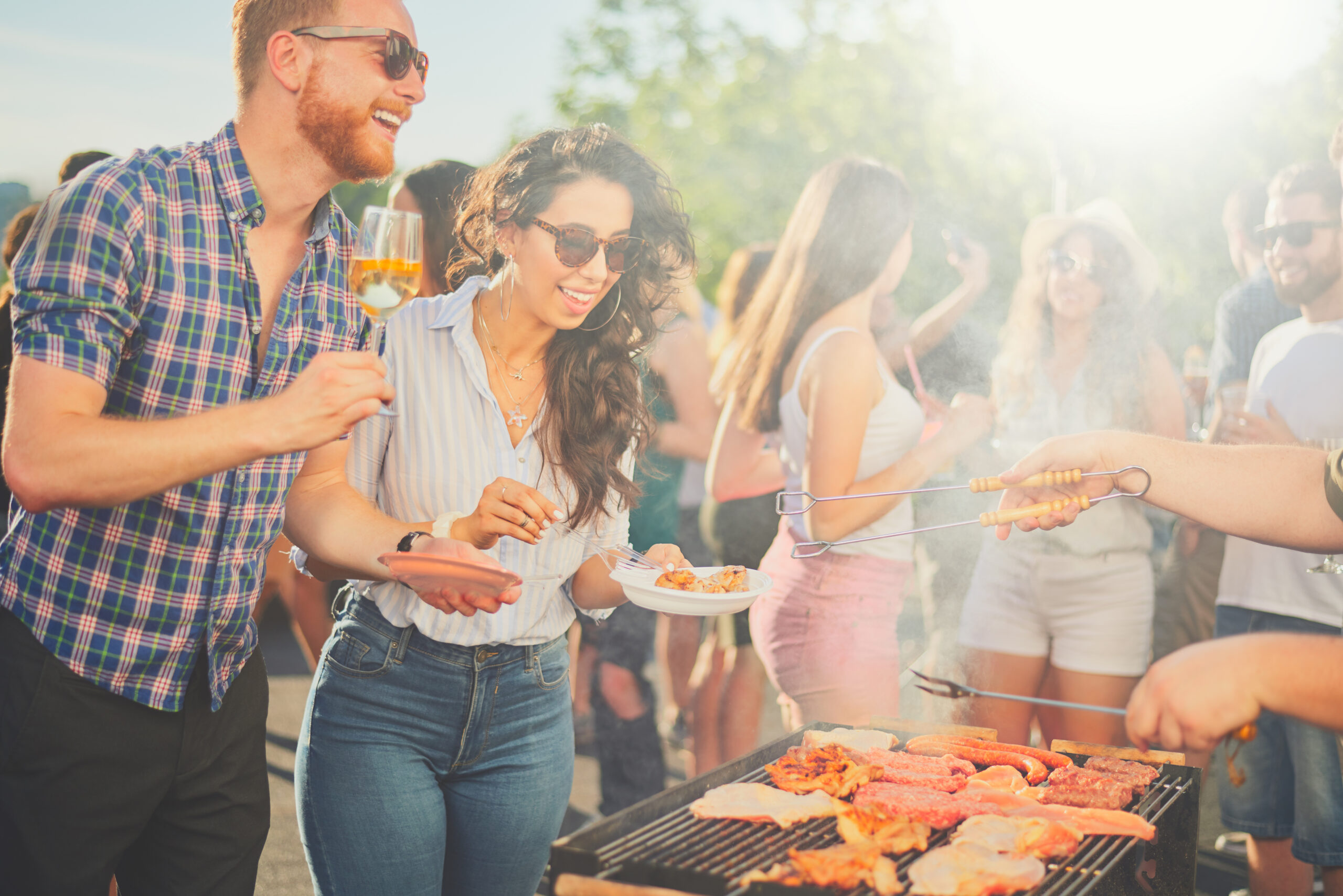 A group of friends having a barbeque party.