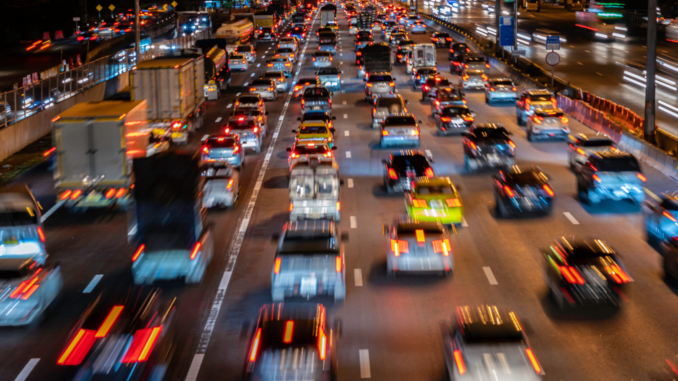 Blurred zoom image of traffic jam in the city at night